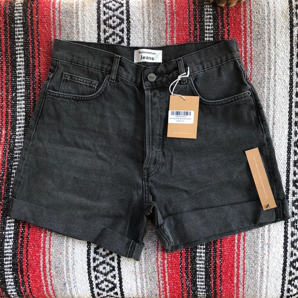 Reformation mid rise relaxed Jean shorts in Seine.